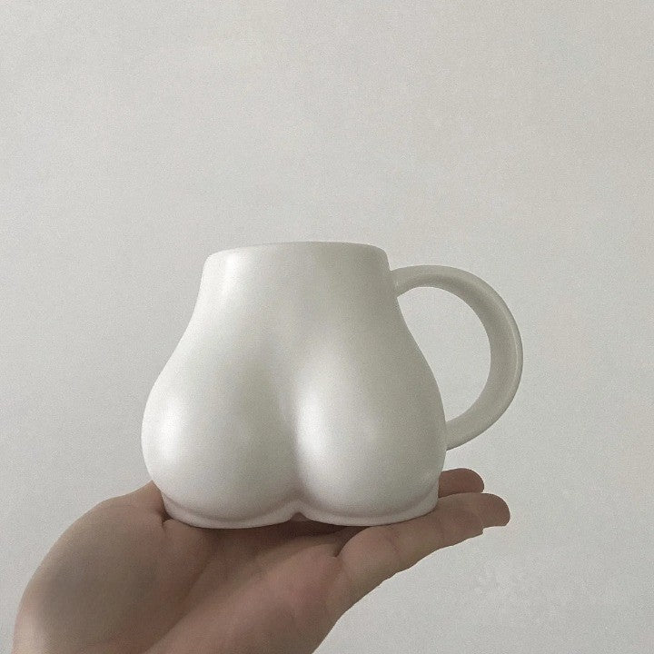 Taza de cerámica con forma de trasero lindo
